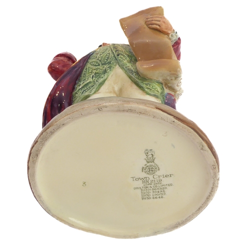 38 - A circa 1952 Royal Doulton figure, 'Town Crier' (HN 2119). (21.5 cm high). 
 (Restored)