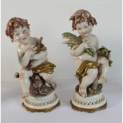 40 - Decorative ceramics to include:
 a set of four Capo di Monte porcelain cherubic-style figures allego... 