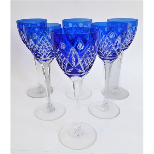 42 - Ten pieces of glassware:
 a good set of six mid to late 20th century blue flash-cut hock glasses; 
 ... 