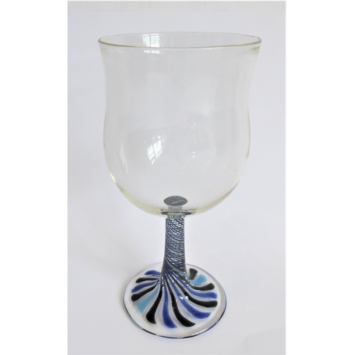 44 - A set of 10 champagne flutes and a set of 8 matching wine goblets. The undersides of both sets signe... 