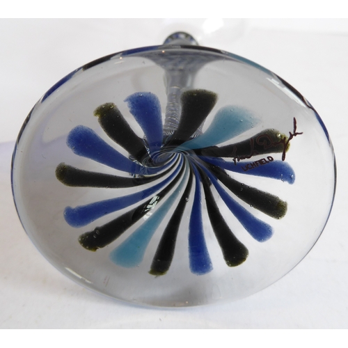 44 - A set of 10 champagne flutes and a set of 8 matching wine goblets. The undersides of both sets signe... 