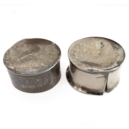 56 - A pair of 19th century silver-mounted brown-glass flasks: the circular silver tops and neck ferrules... 