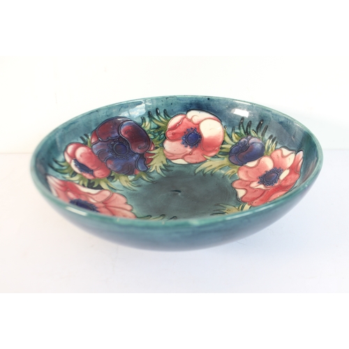 6 - A mid-20th century Moorcroft pottery bowl: tube-lined and hand-decorated in the 'Anemone' pattern. (... 