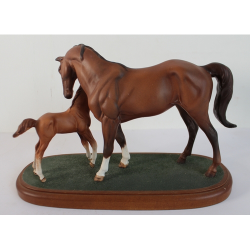 7 - A Beswick model of a grey horse 'Spirit of Freedom' (restored) and another model (possibly Royal Dou... 