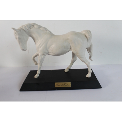 7 - A Beswick model of a grey horse 'Spirit of Freedom' (restored) and another model (possibly Royal Dou... 