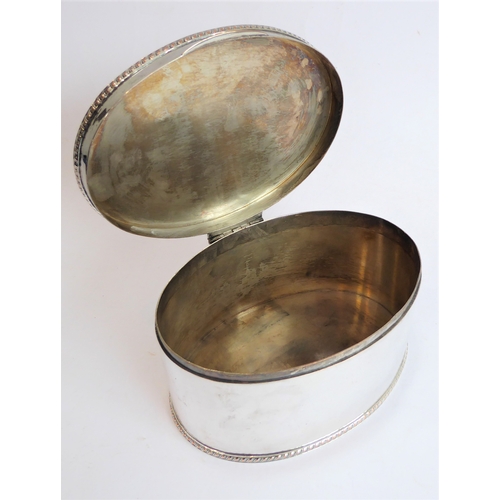 71 - A hallmarked silver easel watch holder, Birmingham 1914 containing a lady's silver-cased fob watch a... 