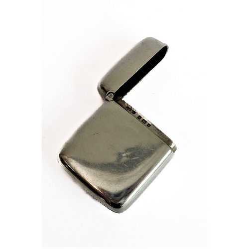 71 - A hallmarked silver easel watch holder, Birmingham 1914 containing a lady's silver-cased fob watch a... 