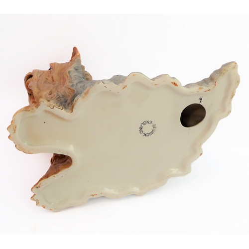 9 - A large fireside-style Beswick model of a Yorkshire Terrier (25.5 cm).
 (Restored)