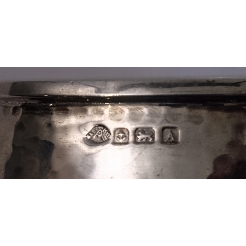 103 - A good hand-planished, hallmarked silver three-piece Arts and Crafts tea service to comprise: 
 a te... 