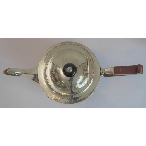 103 - A good hand-planished, hallmarked silver three-piece Arts and Crafts tea service to comprise: 
 a te... 