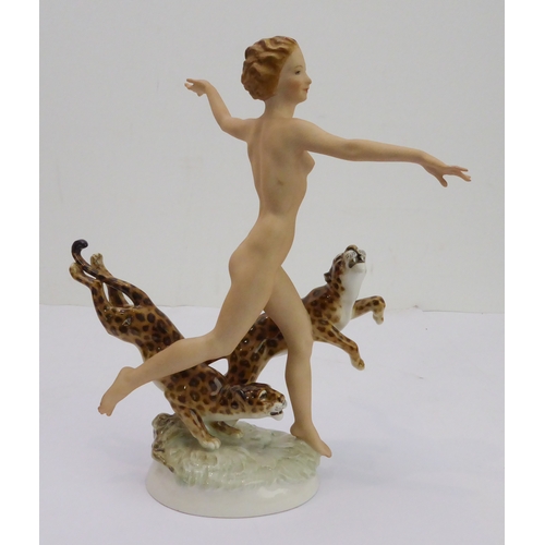 19 - A fine, rare and unusual Jugendstil porcelain figure: an exuberant Circe with leopards; the female f... 