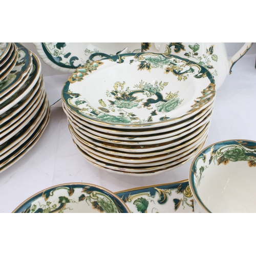 21 - A Mason's 'Chartreuse' dinner service comprising:
 9 x 27, 2 x 26 cm and 4 x 23 cm dinner plates;
 6... 