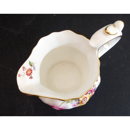 28 - A Royal Crown Derby 'Derby Posies' six-place service comprising tea and coffee cups and saucers, sid... 