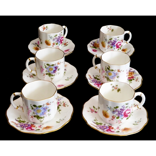 28 - A Royal Crown Derby 'Derby Posies' six-place service comprising tea and coffee cups and saucers, sid... 