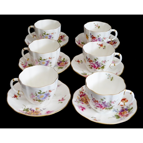 28 - A Royal Crown Derby 'Derby Posies' six-place service comprising tea and coffee cups and saucers, sid... 