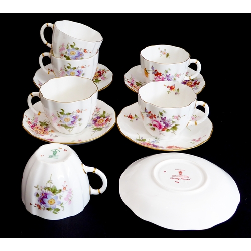 28 - A Royal Crown Derby 'Derby Posies' six-place service comprising tea and coffee cups and saucers, sid... 