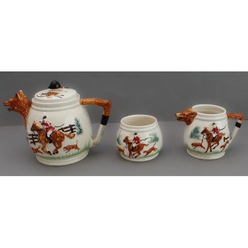 41 - A mixed lot of eight hunting themed pieces:
 1. a three-piece ceramic tea service with foxhunting de... 