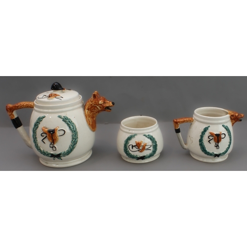 41 - A mixed lot of eight hunting themed pieces:
 1. a three-piece ceramic tea service with foxhunting de... 