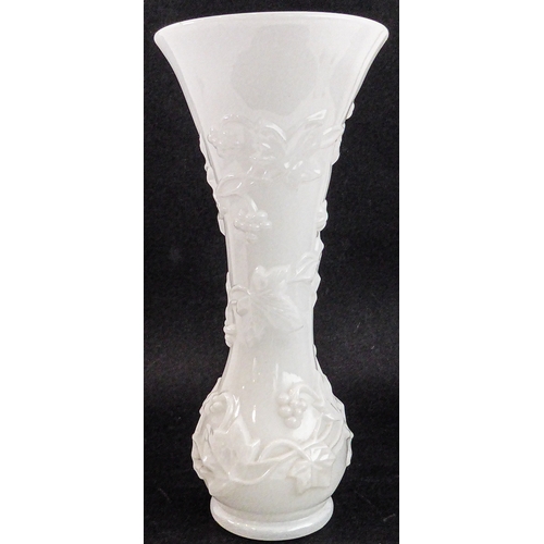46 - A Napoleon III period (1845-1870) Baccarat opaline vase of trumpet form and decorated in high relief... 