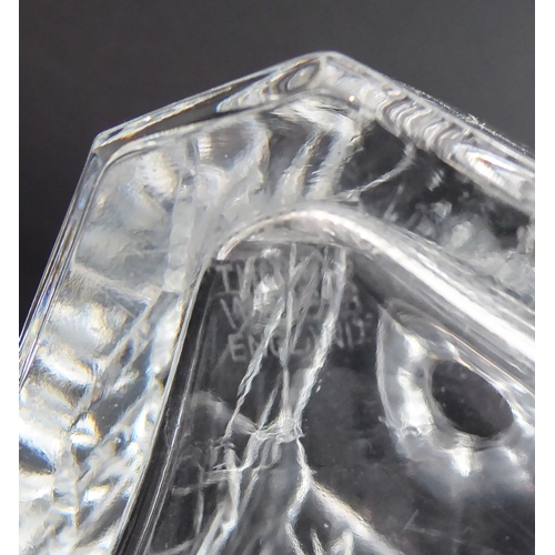 52 - Four quality glass decanters:
 a modern hand-cut mallet-shaped decanter and stopper ;
 a hand-cut sp... 