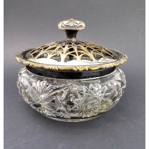 53 - A group of five:
 1. a late 19th century globe-and-shaft jug and stopper; 
 2. an ovoid hand-cut dec... 