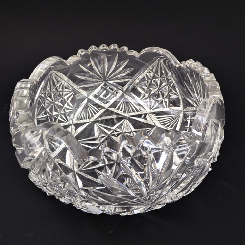 53 - A group of five:
 1. a late 19th century globe-and-shaft jug and stopper; 
 2. an ovoid hand-cut dec... 