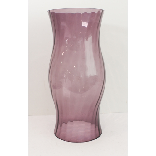 54 - A large amethyst-coloured swirling-glass cover (51cm high)