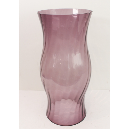 54 - A large amethyst-coloured swirling-glass cover (51cm high)
