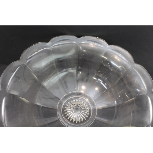 55 - A large Art Deco style clear-glass flowerhead-shaped punch bowl (41.5 diameter x 16.5 cm high) with ... 