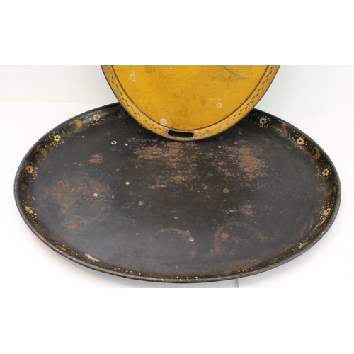 58 - A 19th century tole peinte oval serving tray, the border decorated with flowers; together with one o... 