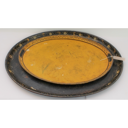 58 - A 19th century tole peinte oval serving tray, the border decorated with flowers; together with one o... 