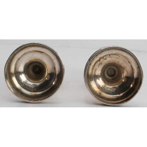 70 - A pair of early 20th century Tiffany & Co. sterling silver pepperettes, each with Celtic-style bands... 