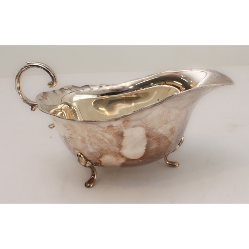 97 - Silver plate to include:
 a modern Robert Welch shaped fruit bowl; 
 a presentation tankard engraved... 