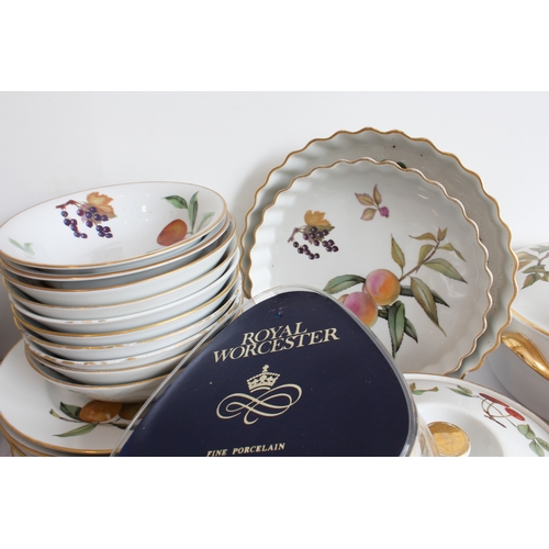 12 - A Royal Worcester 'Evesham' dinner service comprising:
 12 x 26 cm, 12 x 23.5 cm, 12 x 21.5 cm and 1... 