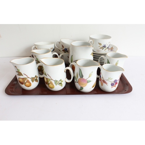 14 - A mixed lot of Royal Worcester (mostly 'Evesham' and a few 'Arden') comprising:
 3 teapots;
 7 sugar... 