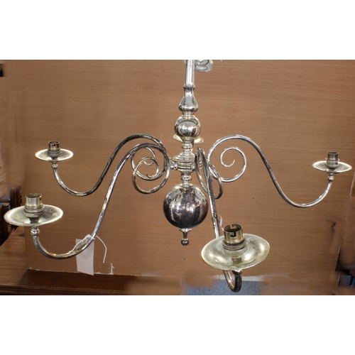 67 - A five-branch silvered chandelier.