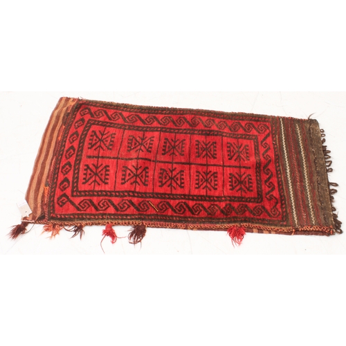 331 - Two early to mid 20th century hand-woven tribal saddlebags with red grounds and stylised repeating p... 