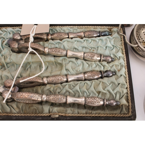 81 - Mostly late 19th to early 20th century silver plate and metalware to include:
 a cased pair of silve... 