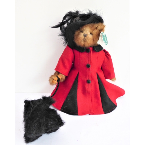 149 - Fifteen collector's dolls to include composition dolls and a bear dressed in long red coat with dog ... 