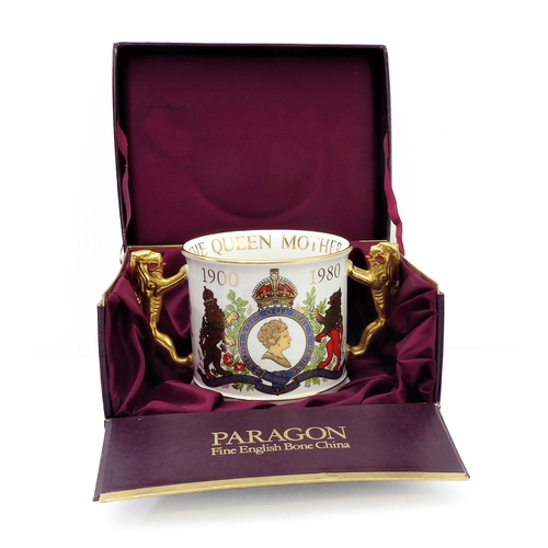 3 - A fine Paragon English Bone China two-handled loving cup: finely hand-gilded and the two handles mod... 