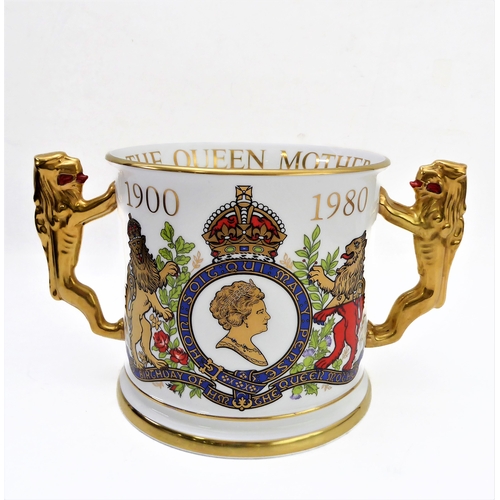 3 - A fine Paragon English Bone China two-handled loving cup: finely hand-gilded and the two handles mod... 