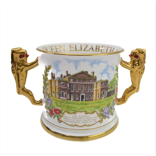3 - A fine Paragon English Bone China two-handled loving cup: finely hand-gilded and the two handles mod... 