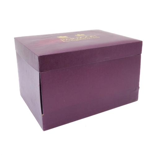 3 - A fine Paragon English Bone China two-handled loving cup: finely hand-gilded and the two handles mod... 