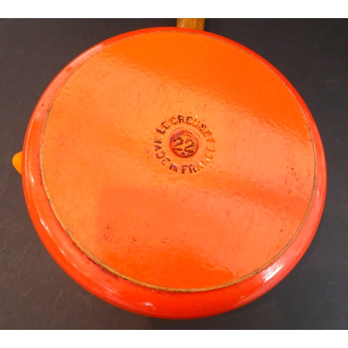 46 - Seven pieces of glassware and a large Le Creuset saucepan:
 a large mid-20th century hand-cut (proba... 