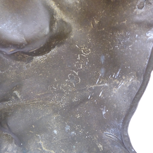 49 - A good and unusual pair of brass and lead-weighted doorstops modelled as lions coward (34 cm high)