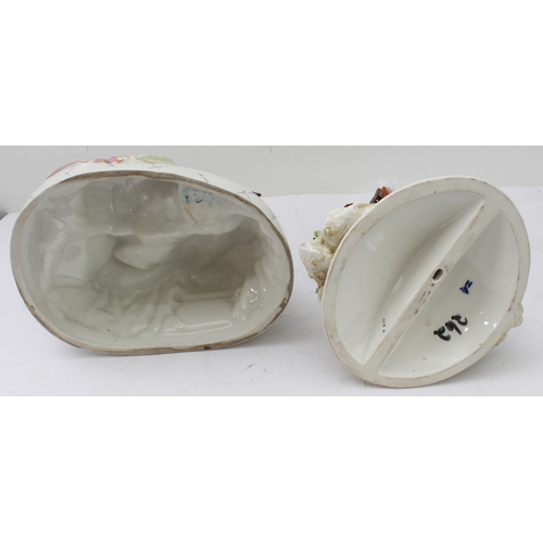 16 - Two pieces:
 1. a 20th century hand-decorated porcelain figure model, an artist drawing a seated lad... 