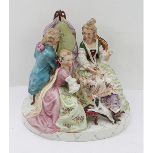 16 - Two pieces:
 1. a 20th century hand-decorated porcelain figure model, an artist drawing a seated lad... 