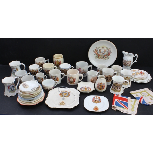 31 - A collection of royal commemorative tankards, cups and saucers, and plates (mostly early to mid 20th... 