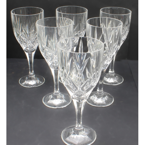 43 - Fine drinking glasses to include:
 1.  a set of six diamond-cut tumblers, five brandy balloons and s... 
