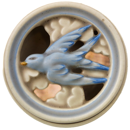 14 - A circular Clarice Cliff Pottery potpourri: the pierced lid modelled as a bluebird in flight, printe... 